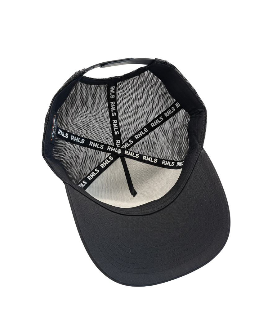Inside view of the RWLS 112, The Black dual snapback mesh trucker hat. Black brim with printed white RWLS logos on black inseam tape. rebelliouswealth.com
