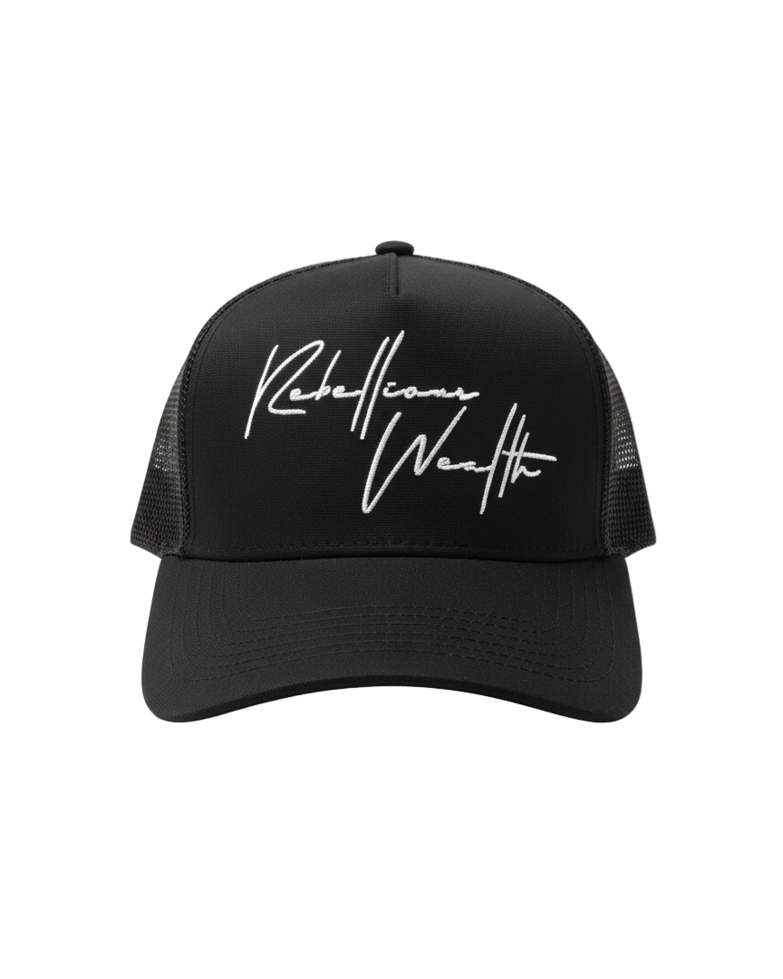 Front view of the RWLS Black snapback trucker hat with mesh sides and white handwritten "rebellious Wealth" script text logo on the front panel.  Black base with white highlights as the colorway. rebelliouswealth.com