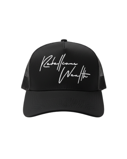 Front view of the RWLS Black snapback trucker hat with mesh sides and white handwritten "rebellious Wealth" script text logo on the front panel.  Black base with white highlights as the colorway. rebelliouswealth.com