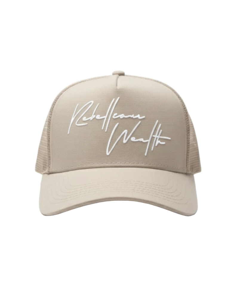 Beige cream color trucker hat with white 'Rebellious Wealth' signature script text logo on the front panel. Mesh side panels. rebelliouswealth.com